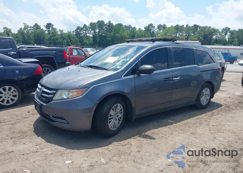 2014 Honda Odyssey Lx z USA, uszkodzony, nr VIN 5FNRL5H2XEB106627